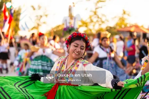 A participant smiles while extending a bright green skirt
